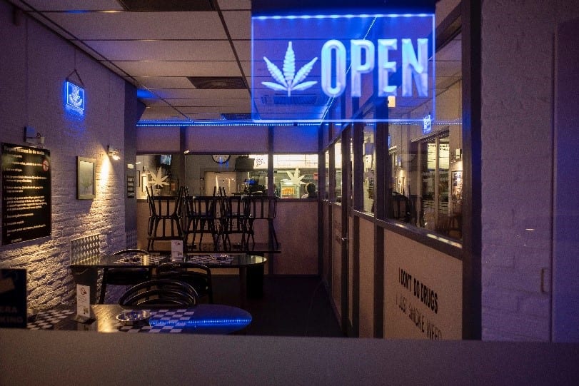 A picture containing indoor sign for cannabis dispensary